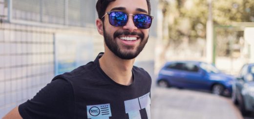 close up photography of man wearing sunglasses