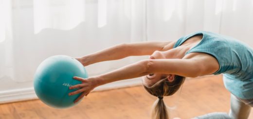 fit woman exercising with gymnastic ball