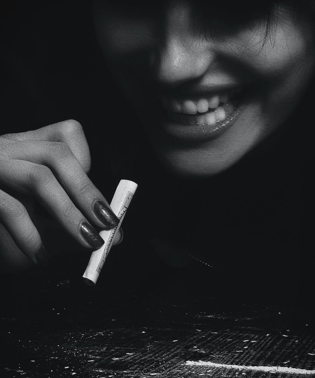 woman holding a blunt