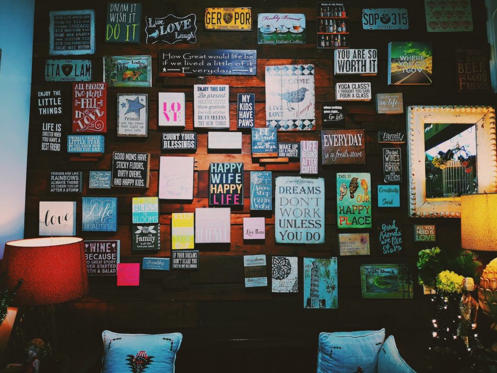 photo of assorted letter board quote hanged on wall