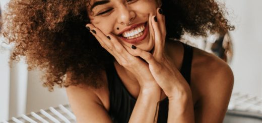 woman sitting and smiling