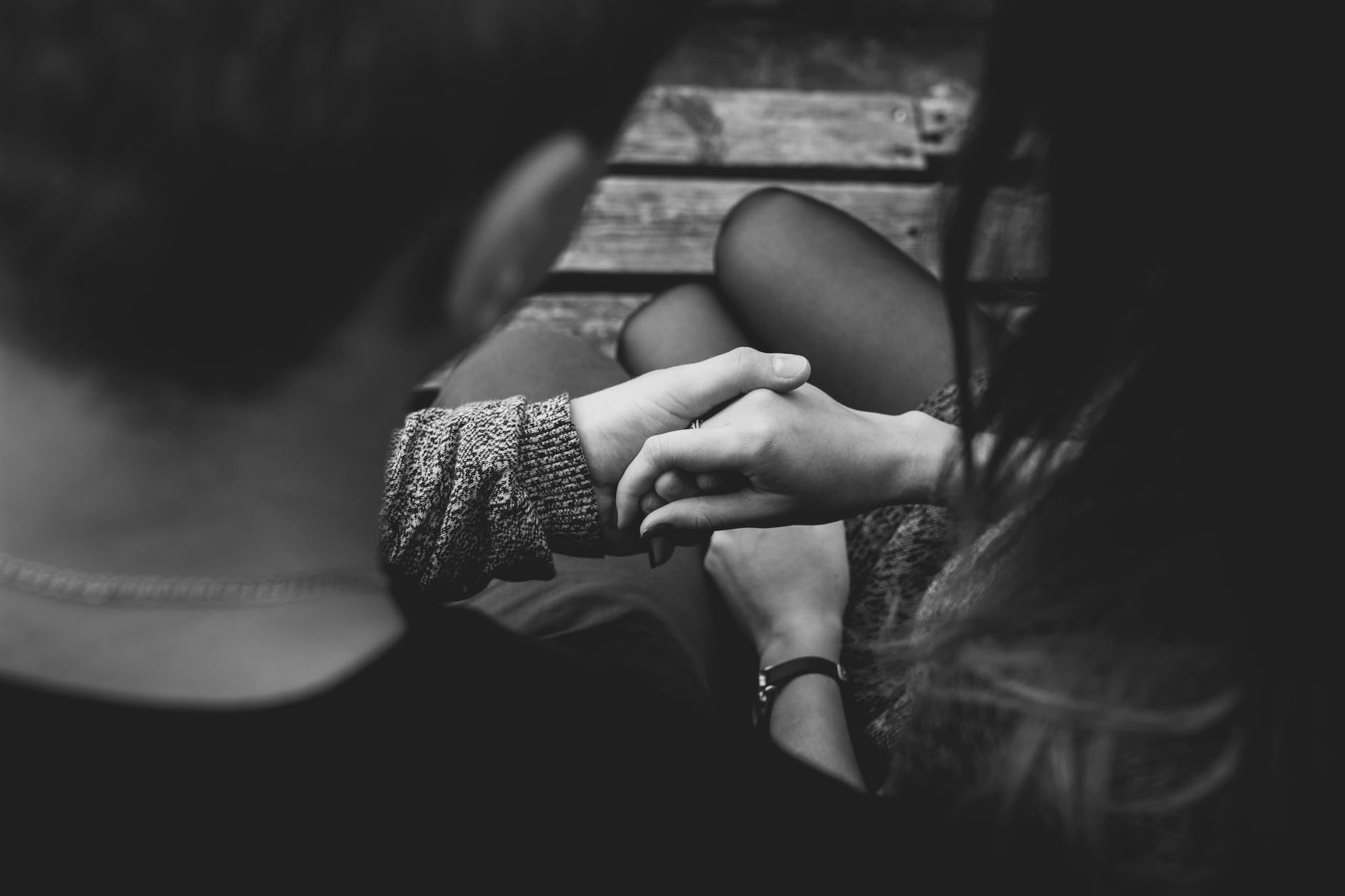 close up of couple holding hands