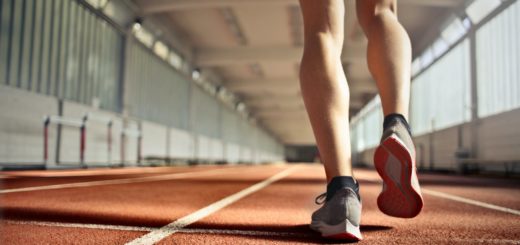 fit athlete during training on running track