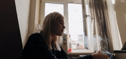 a woman smoking a cigarette