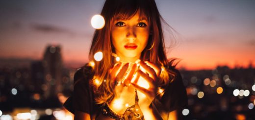 woman holding fireflies