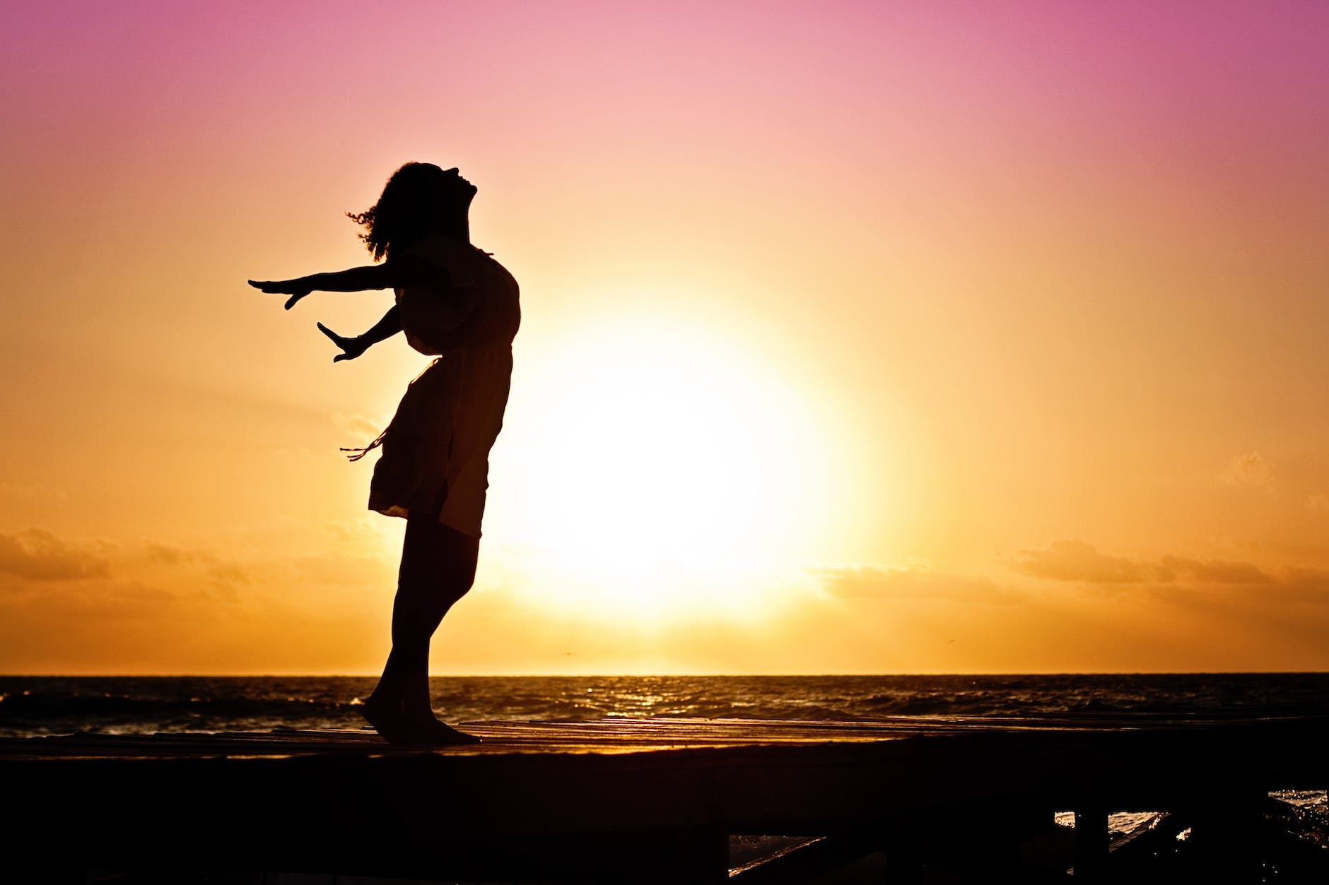 lady in beach silhouette during daytime photography