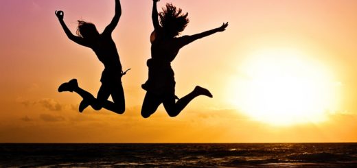 silhouette photography of jump shot of two persons