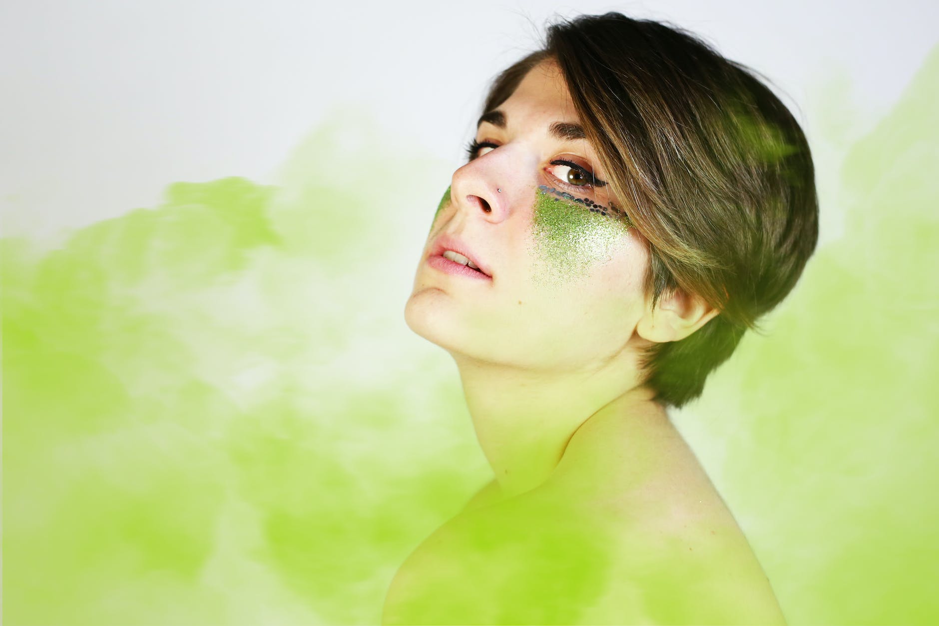 woman with green face paint