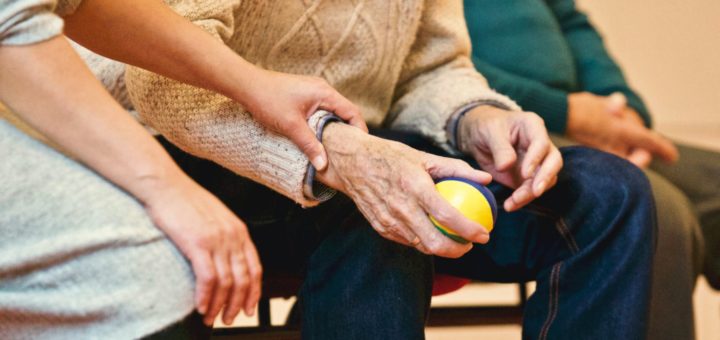 person holding a stress ball