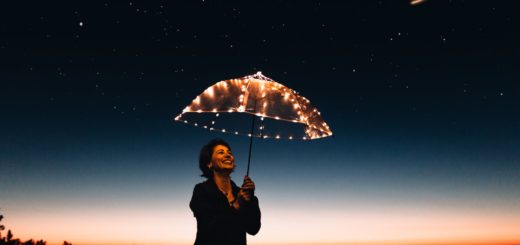 woman using umbrella with lights