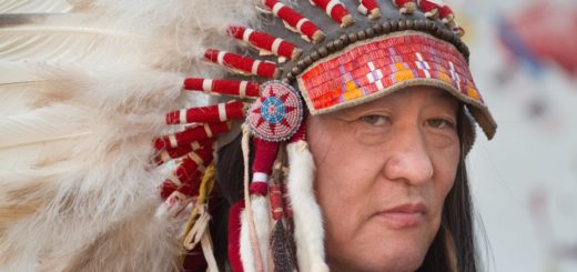 man in feather headdress