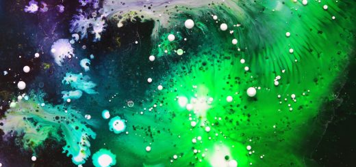 close-up photography of green, white, and purple paint splash