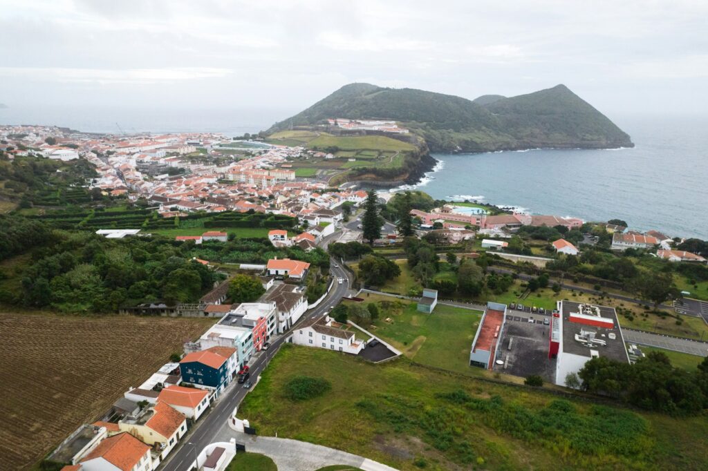 A bird's eye view of a town and a body of water